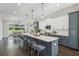 Bright kitchen with a large island, stainless steel appliances, and adjacent dining area at 1140 Hubbard Sw St, Atlanta, GA 30310