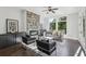 Cozy living room with a stone fireplace, creating a warm and inviting atmosphere for relaxation and gatherings at 1140 Hubbard Sw St, Atlanta, GA 30310