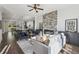 Spacious living room featuring a stone fireplace and open layout, perfect for modern living and entertaining guests at 1140 Hubbard Sw St, Atlanta, GA 30310