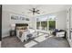 Sunlit bedroom with large windows, neutral decor, and comfortable furnishings at 1140 Hubbard Sw St, Atlanta, GA 30310