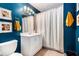 Stylish bathroom featuring modern fixtures, vanity with sink, and shower with curtain at 1931 Mceachern Manor Sw Dr, Marietta, GA 30064