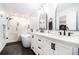 Elegant bathroom with a soaking tub, glass-enclosed shower, and double vanity sinks at 1931 Mceachern Manor Sw Dr, Marietta, GA 30064