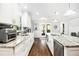 Bright kitchen with stainless steel appliances and a marble countertop island at 1931 Mceachern Manor Sw Dr, Marietta, GA 30064