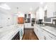 Bright kitchen with stainless steel appliances and a marble countertop island at 1931 Mceachern Manor Sw Dr, Marietta, GA 30064