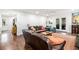 Spacious living area with hardwood floors, comfortable sofas, and access to other parts of the home at 1931 Mceachern Manor Sw Dr, Marietta, GA 30064