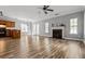 Bright living room with hardwood floors, fireplace, and large windows allowing ample natural light at 206 Cole Ct, Canton, GA 30114