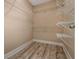 Functional walk-in closet with wire shelving to maximize storage space at 206 Cole Ct, Canton, GA 30114