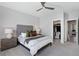 Cozy bedroom features a ceiling fan, carpet, and ensuite at 2424 Lakeshore Se Ln, Atlanta, GA 30316