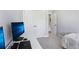 Bedroom featuring double closet, white walls, and bed with open doorway at 2424 Lakeshore Se Ln, Atlanta, GA 30316