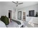 Light-filled bedroom with gray walls, a walk-in closet and ensuite at 2424 Lakeshore Se Ln, Atlanta, GA 30316