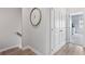 A hallway with wood-look floors and a view into a bedroom at 2424 Lakeshore Se Ln, Atlanta, GA 30316