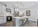 Stylish kitchen with a center island, pendant lighting, and stainless steel appliances at 2424 Lakeshore Se Ln, Atlanta, GA 30316
