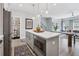 Spacious kitchen island with seating, providing an open view to the living room at 2424 Lakeshore Se Ln, Atlanta, GA 30316