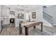 Modern kitchen with stainless steel appliances, a kitchen island, and an adjacent dining area at 2424 Lakeshore Se Ln, Atlanta, GA 30316