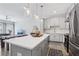 Open concept kitchen with a large island, stainless steel appliances, and modern finishes at 2424 Lakeshore Se Ln, Atlanta, GA 30316