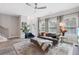 Cozy living room with large windows, modern furnishings, and an open layout at 2424 Lakeshore Se Ln, Atlanta, GA 30316