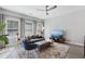 Comfortable living room featuring a plush sofa, stylish decor, and plenty of natural light at 2424 Lakeshore Se Ln, Atlanta, GA 30316