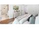 Cozy bedroom with a view into the ensuite bathroom and a hallway area at 5232 W Mountain St, Stone Mountain, GA 30083