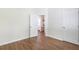A view from one bedroom out into a hall and looking into another bedroom at 5232 W Mountain St, Stone Mountain, GA 30083