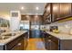 Spacious kitchen features stainless steel appliances, granite countertops, and ample cabinet space at 7144 Gladstone Cir, Stonecrest, GA 30038