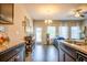 Well-designed kitchen featuring granite countertops and modern appliances with an open floor plan at 7144 Gladstone Cir, Stonecrest, GA 30038