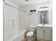 Full bathroom featuring a tub, a toilet, a shower, and a sink at 2529 Ridgecrest Nw Dr, Kennesaw, GA 30152