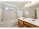 Bright bathroom with a soaking tub and a double sink vanity at 2529 Ridgecrest Nw Dr, Kennesaw, GA 30152