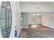 Bright foyer with a view into the living room, featuring carpet and natural light at 2529 Ridgecrest Nw Dr, Kennesaw, GA 30152