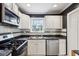 Well-equipped kitchen with stainless steel appliances and sleek countertops at 2529 Ridgecrest Nw Dr, Kennesaw, GA 30152