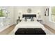 Bedroom featuring natural light, modern decor, and an ensuite bathroom at 4059 Yellow Creek Trl, Cumming, GA 30028