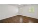 Bedroom with beautiful hardwood floors and natural light at 4477 Jett Nw Rd, Atlanta, GA 30327
