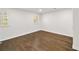 Bedroom with beautiful hardwood floors and lots of natural light at 4477 Jett Nw Rd, Atlanta, GA 30327