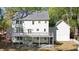 Exterior rear elevation of home featuring large deck and spacious yard at 4477 Jett Nw Rd, Atlanta, GA 30327