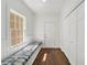 Hallway with bench seat, closet, and natural light at 4477 Jett Nw Rd, Atlanta, GA 30327