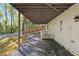Covered patio of home with stone groundcover offering ample outdoor living space and shade at 4477 Jett Nw Rd, Atlanta, GA 30327