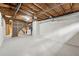 Unfinished basement with laundry area and concrete floor at 3826 Ensign Dr, Chamblee, GA 30341
