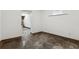 Open-concept basement featuring clean lines and concrete floor at 3826 Ensign Dr, Chamblee, GA 30341