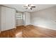 Bedroom with hardwood floors and dual closets for ample storage at 3826 Ensign Dr, Chamblee, GA 30341
