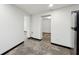 Open-concept hallway featuring clean lines and concrete floor at 3826 Ensign Dr, Chamblee, GA 30341