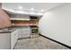 Cozy kitchen with stainless steel appliances and light cabinetry at 3826 Ensign Dr, Chamblee, GA 30341