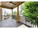 Relax on this charming balcony with lovely views and ceiling fan at 384 16Th Nw St # 1, Atlanta, GA 30363