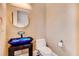 Stylish bathroom features a unique vanity with a blue glass sink at 384 16Th Nw St # 1, Atlanta, GA 30363