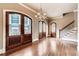 Elegant dining room features a modern chandelier and hardwood floors at 384 16Th Nw St # 1, Atlanta, GA 30363