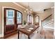 Elegant dining room with a modern chandelier and hardwood floors at 384 16Th Nw St # 1, Atlanta, GA 30363