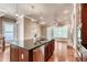 Modern kitchen boasts an island with bar seating and stainless steel appliances at 384 16Th Nw St # 1, Atlanta, GA 30363