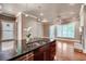 Modern kitchen boasts an island and stainless steel appliances at 384 16Th Nw St # 1, Atlanta, GA 30363
