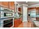 Gourmet kitchen features stainless steel appliances and sleek cabinetry at 384 16Th Nw St # 1, Atlanta, GA 30363