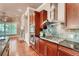Modern kitchen boasts stainless appliances, granite countertops, and custom backsplash at 384 16Th Nw St # 1, Atlanta, GA 30363
