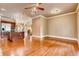 Spacious living room boasts hardwood floors, modern lighting, and plenty of natural light at 384 16Th Nw St # 1, Atlanta, GA 30363