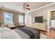 Serene main bedroom with ample natural light, modern furniture, and hardwood floors at 384 16Th Nw St # 1, Atlanta, GA 30363